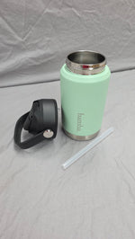 Load image into Gallery viewer, Mint green thermos with black lid and straw on a gray background
