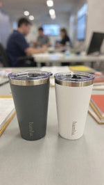 Load image into Gallery viewer, Two insulated bamba coffe tumblers on a desk with a blurred office background
